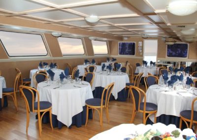 131 Swiftship yacht dining tables